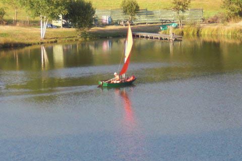 mirror dinghy on lake